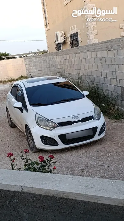 كيا برايد للبيع 2013 ديزل جير عادي ماطور 1400 ترخيص وتأمين شامل لشهر 1 /2026  اصل برايفت فل اضافات ل