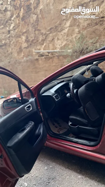 بيجو 307 2005  مطور2000 100% مكنيكيات الف الف دهان جديد مزجان حامي بارد منفوضة من النمرة ل النمرة