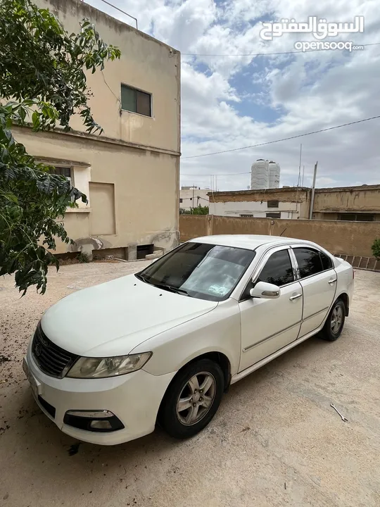 كيا اوبتما لوتسي 2009 لون ابيض بحالة جيدة جدا