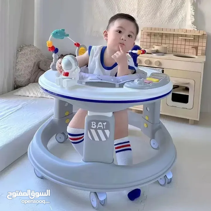 عرض خاص على مشّاية الأطفال الذكية 360 درجة من Island Toys مع اضاءة على الدائرة العلويه للكراجة