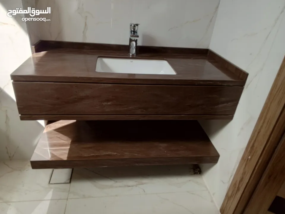 تفصيل مغاسل واسطح مطابخ وكاونتر استقبال وتلبيس اعمدة رخام صناعي مغسله اكريليك corian بورسلان كوارتز