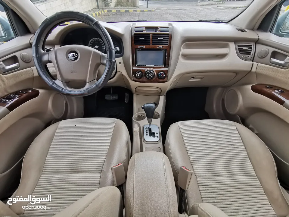 كيا سبورتاج بحالة ممتازة Kia Sportage 2006