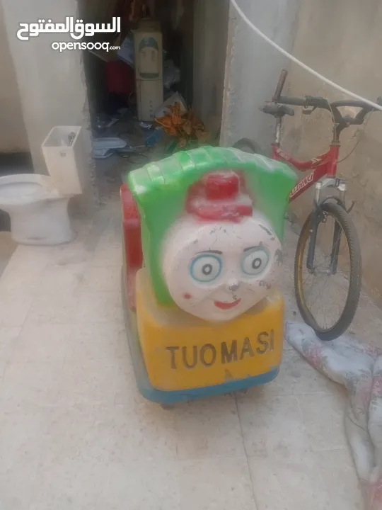 لعبة سيارة هزازي للأطفال لابواب المحلات