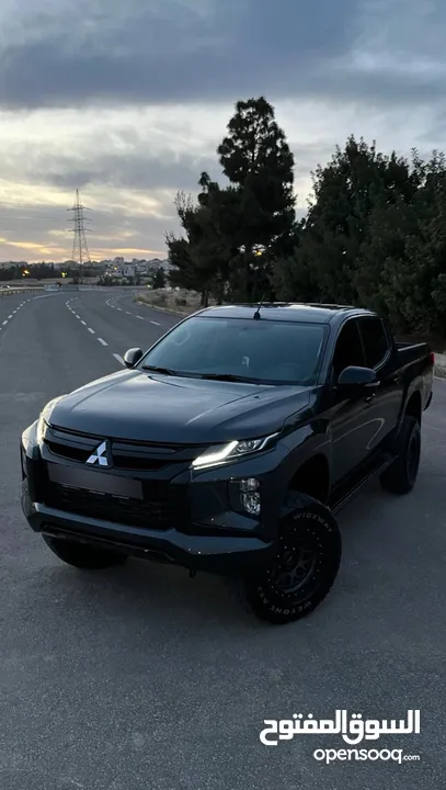 معدل Mitsubishi L200 sportero 2023 وارد و كفالة الوكالة اعلى صنف