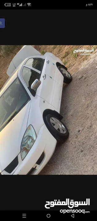 لانسر موديل 2010  لونها ابيض