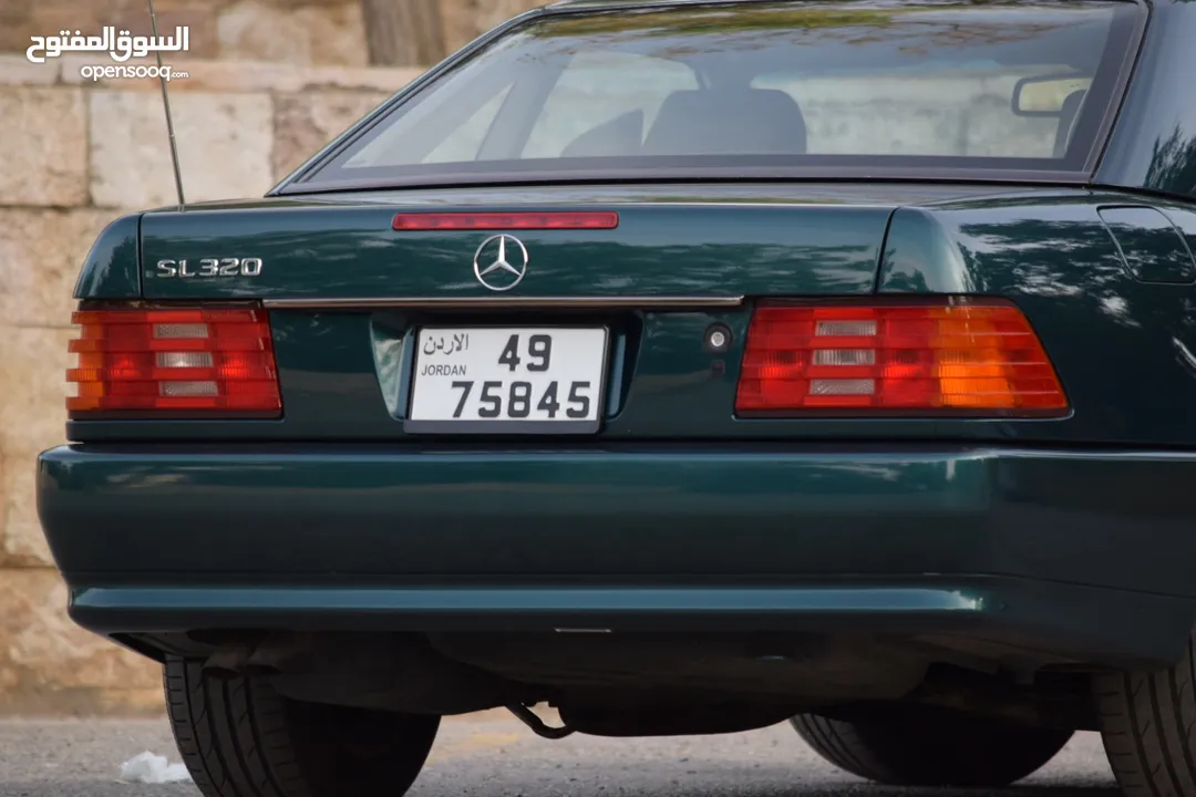Mercedes SL320 1995 بحالة الوكالة