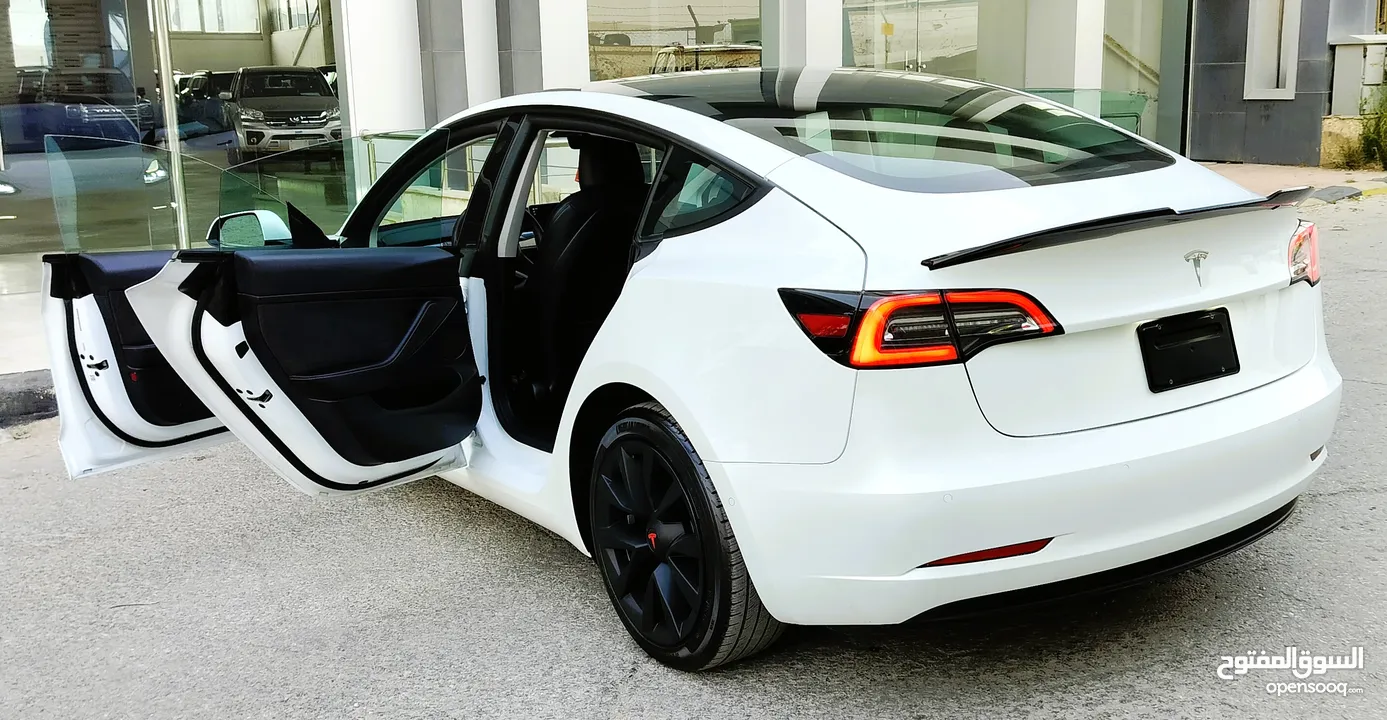 تيسلا 2022 model 3 فحص كامل 4 جـــيـــد بدون ملاحظات بودي (كرت ابيض) بحالة الوكالة بسعر لقطة ومحرووق
