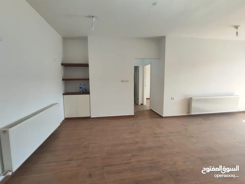 شقة قيد الفرش للإيجار – عين منجد / شارع إسكان المهندسين
