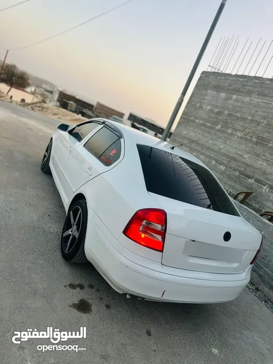 سكودا نيو 2006 دهان جديد  فحص ممتاز وتخلو من القص والضربات هيئه جديد فرش جلد  شاشه اندرو