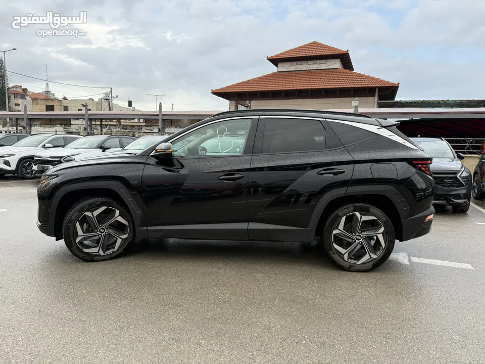 هونداي توسان ترخيص 2022 محرك 1600 هايبرد plug in/يقطع على الشحنه 65 كيلو متر جير أوتوماتيك