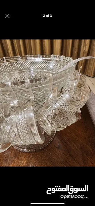 Glass bowl with cups and spoon