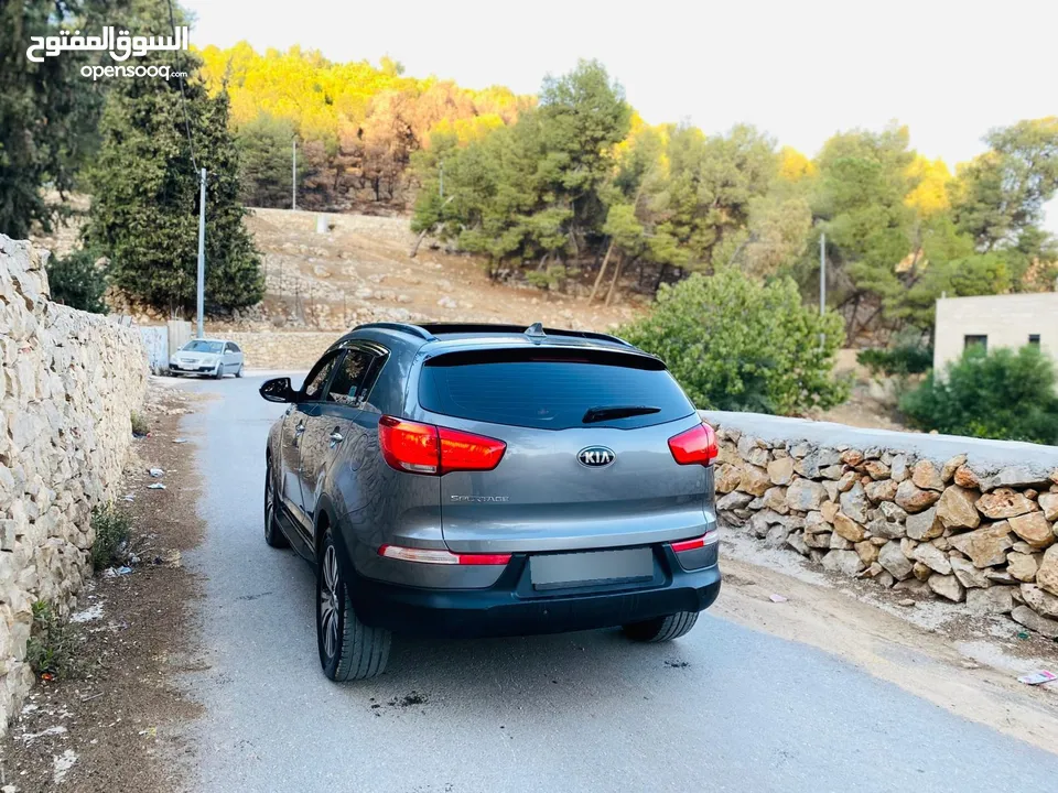 كيا سبورتاج فل الفل مع فتحة بسعر حرق 2015 رخصة