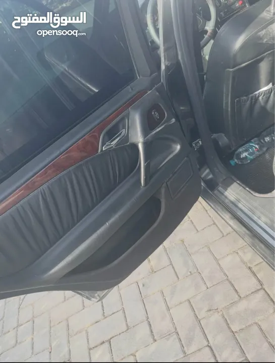 مرسيدس W210