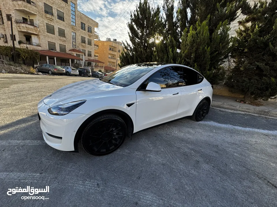 ممشى 6 الاف ميل -  بسعر حرق Tesla Y long range 2021