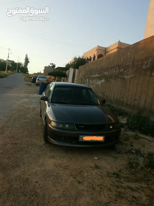 لانسر موديل  99 توماتيك وارد  خليجي ماتور 1500دبل كام شفت اللي ناوي ما بقصر معه بعيد عن تجار