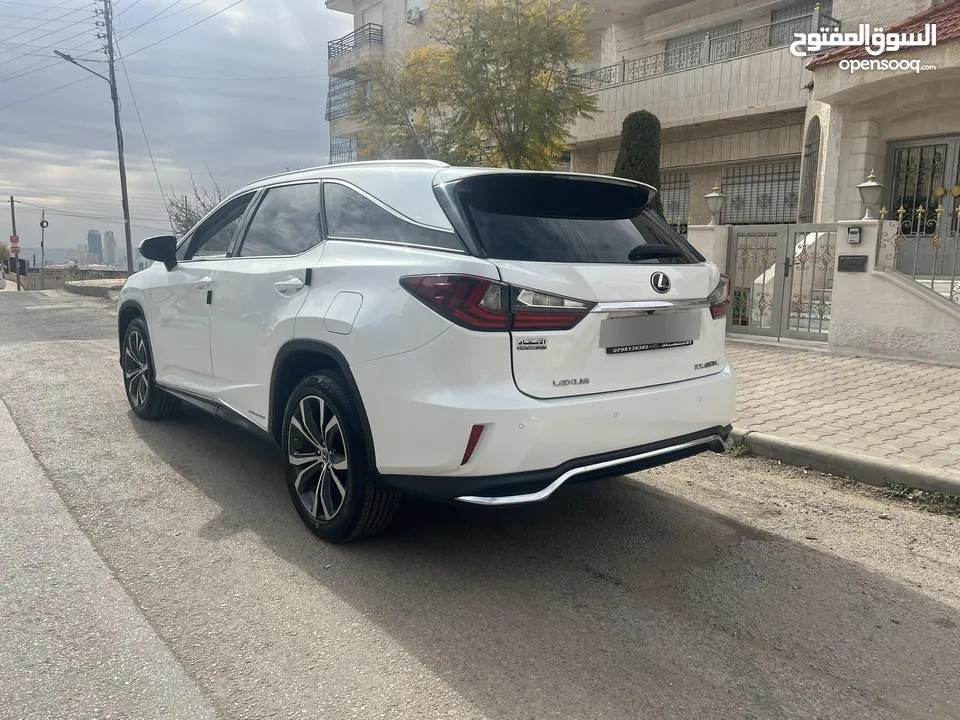 لكزس RX450hL موديل 2018 لون ابيض لؤلؤي وارد وصيانه الوكاله اعلى تصنيف من فئتها