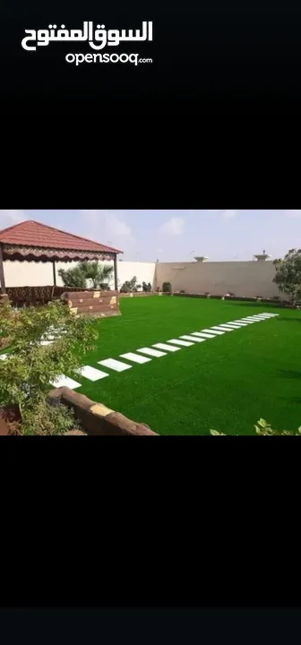 عشب صناعي (ترتان) وأشجار و ورد صناعي