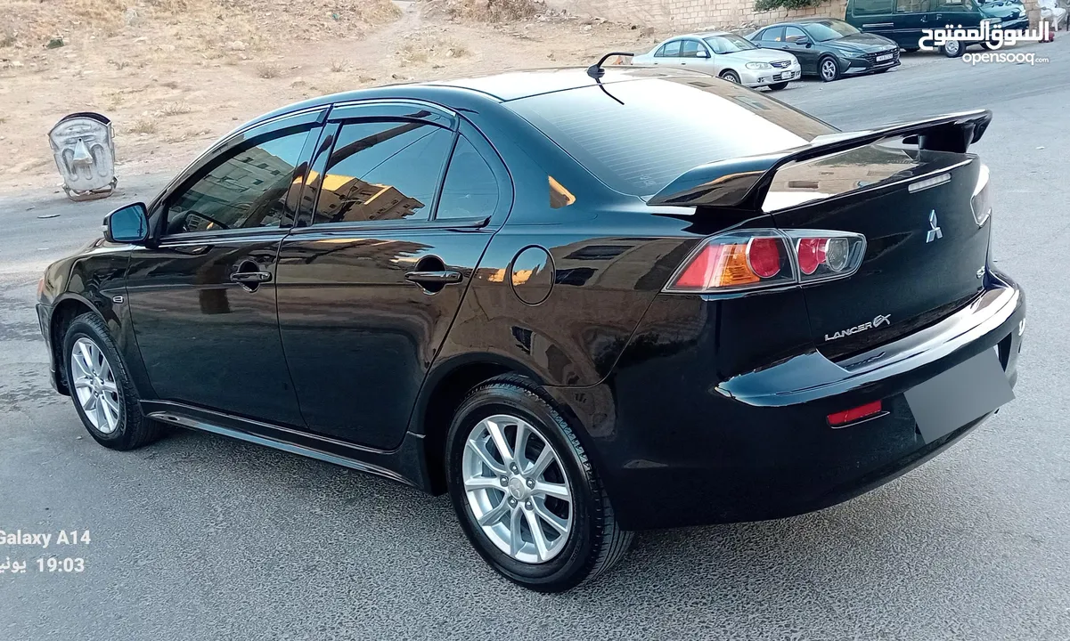 متسوبيشي لانسر فراشة موديل 2015 فحص مرفق مع الصور بحالة الوكاااااالة  ماشية 49 الف km  أصلي