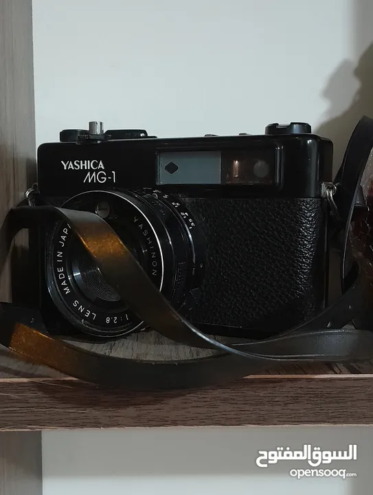 كاميرا فنتيج قديمة Yashica mg-1 جلد باللون الأسود معها حزامها شغالة للبيع ب 50 دينار بدون شريط فيلم