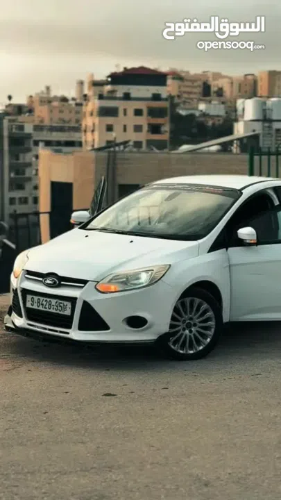 فورد فوكس موديل 2013 متور 1600 بنزين اسيارة بتحكي عن حالها بصور مش ناقصها غير الصلاة على نبي