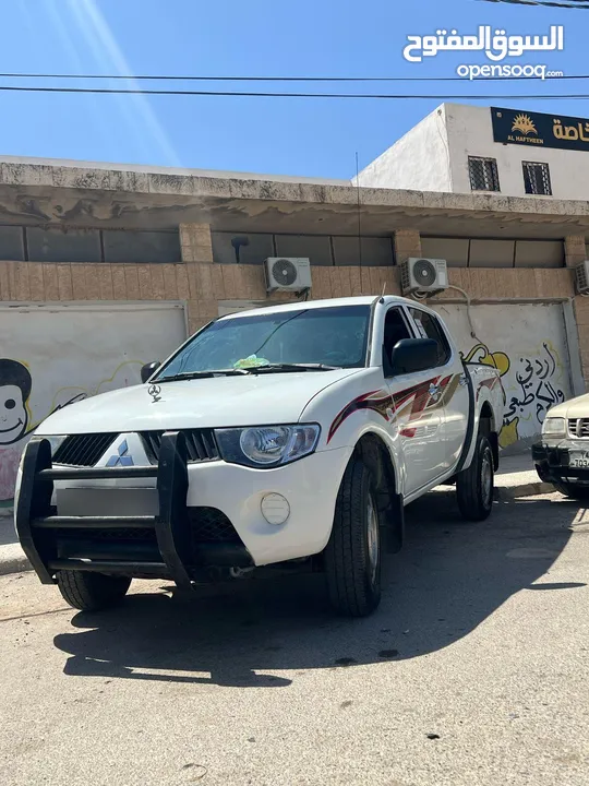 l200 موديل  2009 فحص كامل مالك ثاني من الحره ماشيه 226 الف