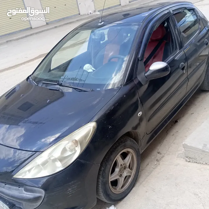 بيجو 206 بلس لون اسود ماتور 1400