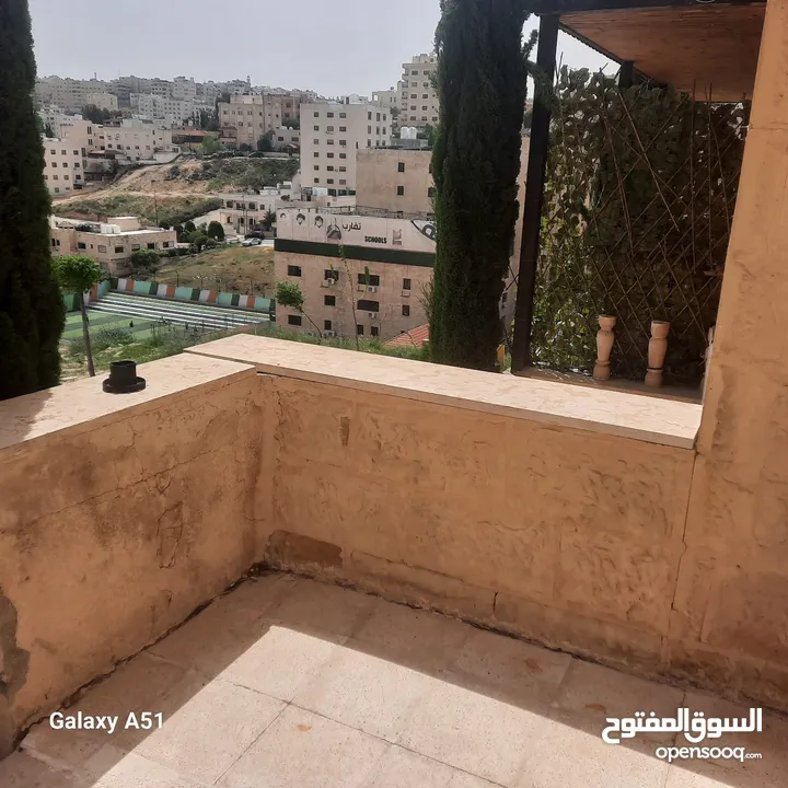 شقة للبيع شبه ارضي بأجمل مناطق ضاحية الرشيد