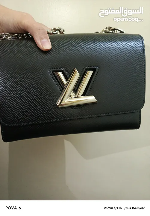 شنطه يد Louis Vuitton