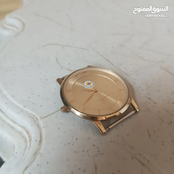 ساعة سويسرية مطلية بالذهب Exotic