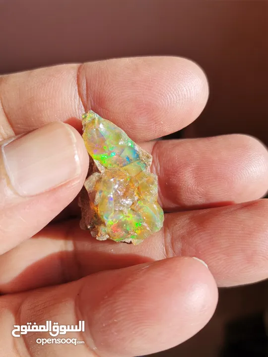 حجركريم اوبال ملتي كلر ناري Opal gemstone