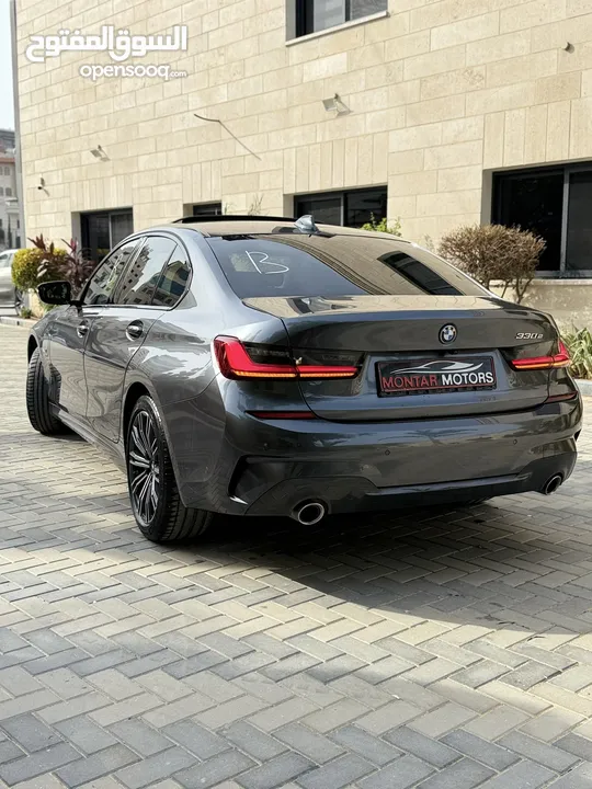 ترخيص 2022 BMW  330e  محرك 2000 هايبرد plug in/يقطع على الشحنه 50 كيلو متر  297 حصان