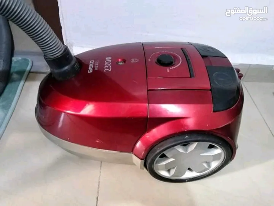 مكنسة كهربائية لون خمري