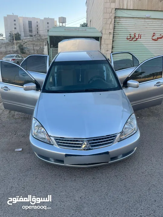 متسوبيشي لانسر 2004محدثه بالكامل 2013