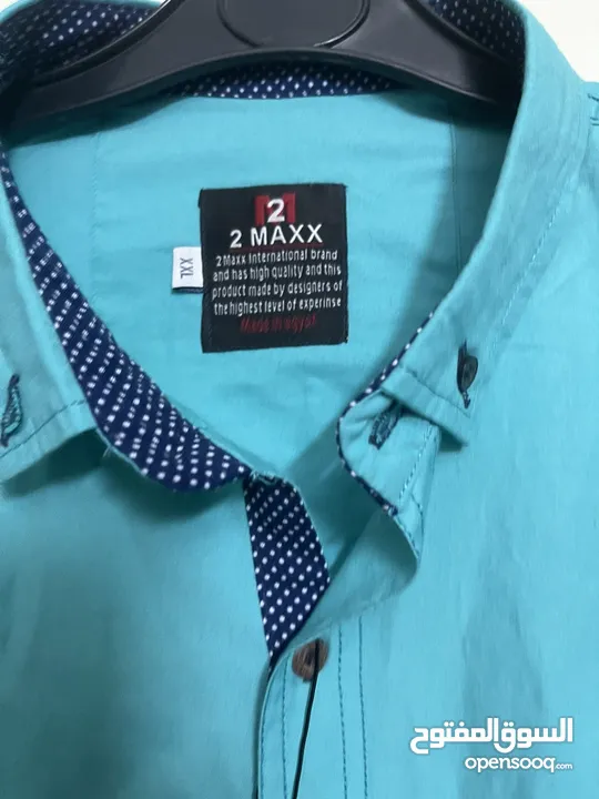 قميص رجالي تركواز جديد مقاس XXL  شيك اوي في اللبس الطول 76 سم والعرض 60 سم
