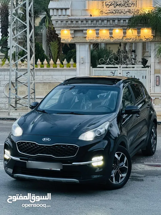 كيااا سبورتاج مطور 2000 بنزين 2*4 الجيب بالكراتين فل اضافات ملغم امكانية البيع نص بالنص الله يبارك