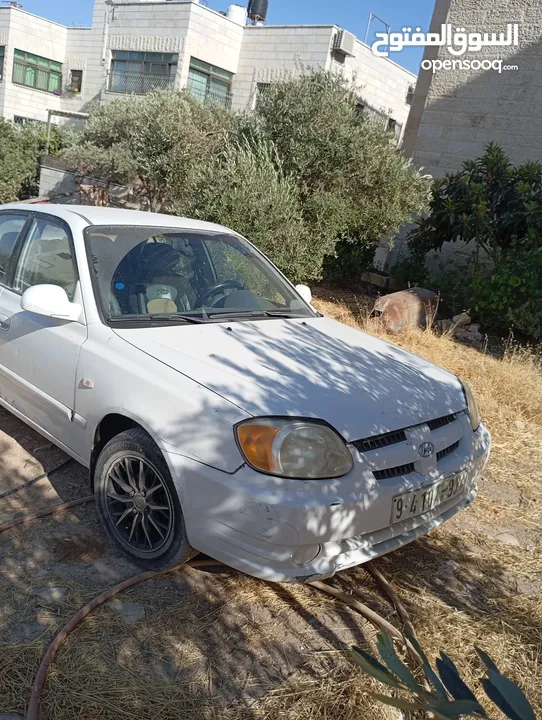 سيارة هونداي فيرنا 2003ميكانيكيات جيدة جدا وعيوب بسيطة بالبودي