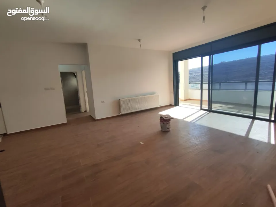 شقة شبه مفروشة للإيجار – عين منجد، شارع إسكان المهندسين