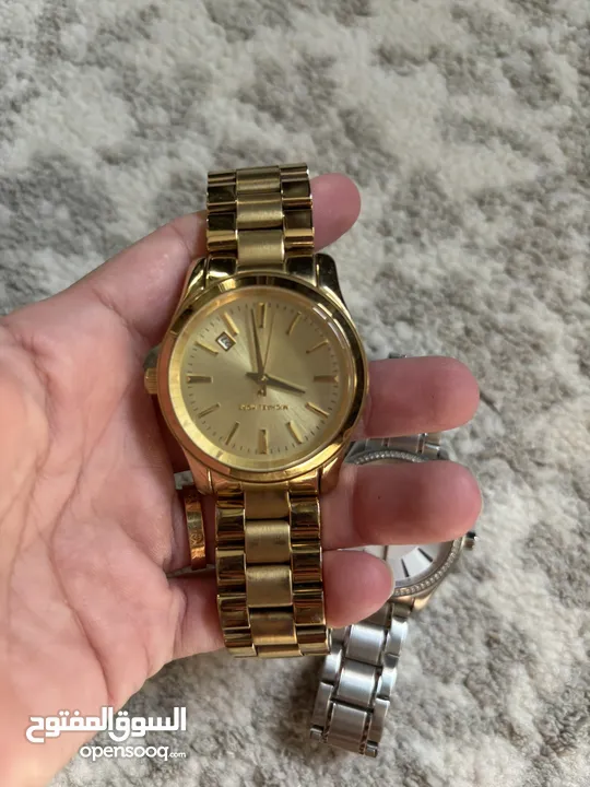 Michael Kors and Armani Exchange Women’s watches. Used but in good condition.