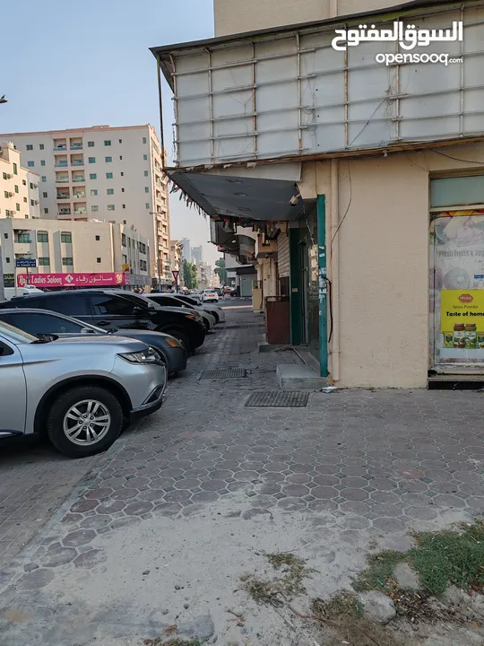 محل للايجار في عجمان منطقه الرميله سعر الايجار 22000 درهم تكيف موجود Shop for rent in ajman