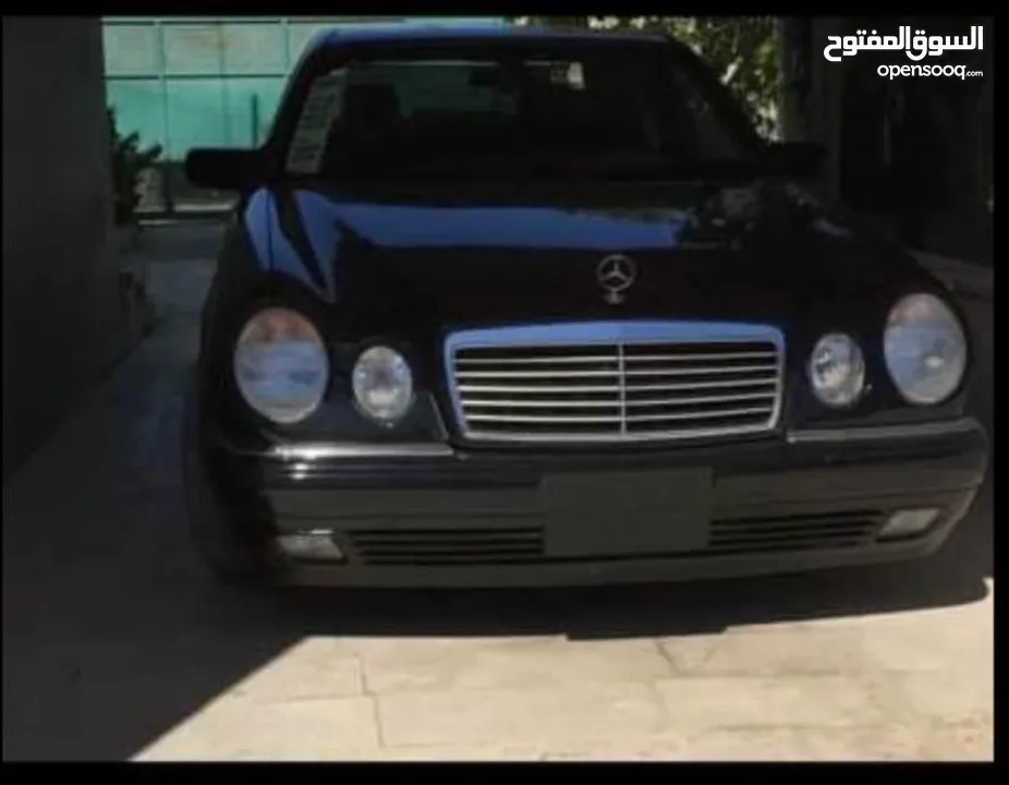 مرسيدس W210