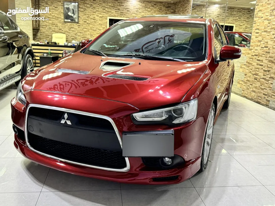 ميتسوبيشي لانسر موديل 2015 GT اصلي فحص كامل بحالة الوكاله فل كامل اعلى صنف من فئتها