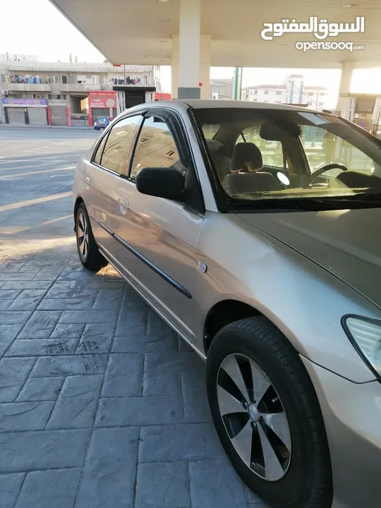 هوندا سيفيك 2004...للبيع او .....للبدل ع فورد cmax............