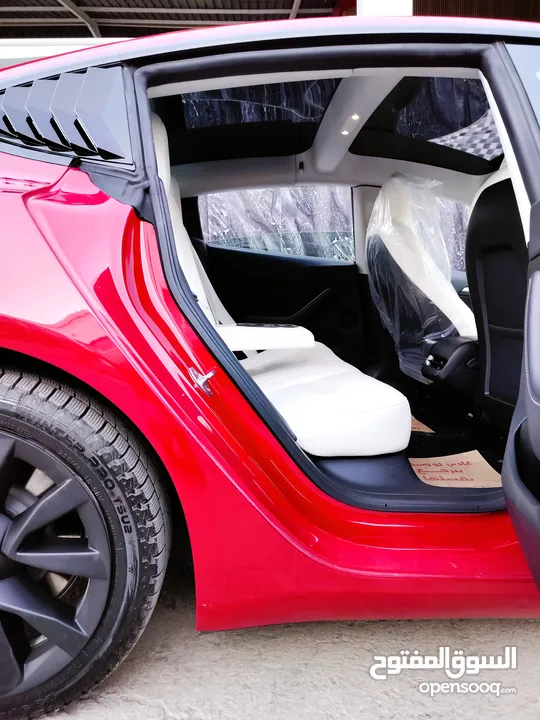 تيسلا 2022 model 3 فحص كامل 4 جــيـــد بدون ملاحظات غرفة جلد ابيض لون مميز بحالة الوكالة بسعر لقطة