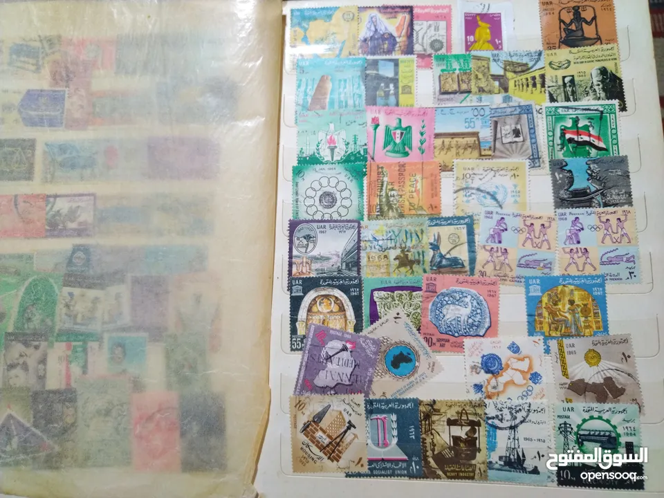 نيشان ملكى وزن41, 41 جرام من الدهب والفضه وعقدفضه من الاحجار الكريمه وطوابع قديمه نادره