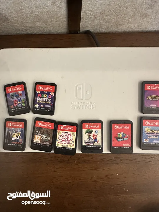 Nintendo Switch OLED w/ Games and Accessories  - نينتندو سويتش OLED مع لعبة وملحقات