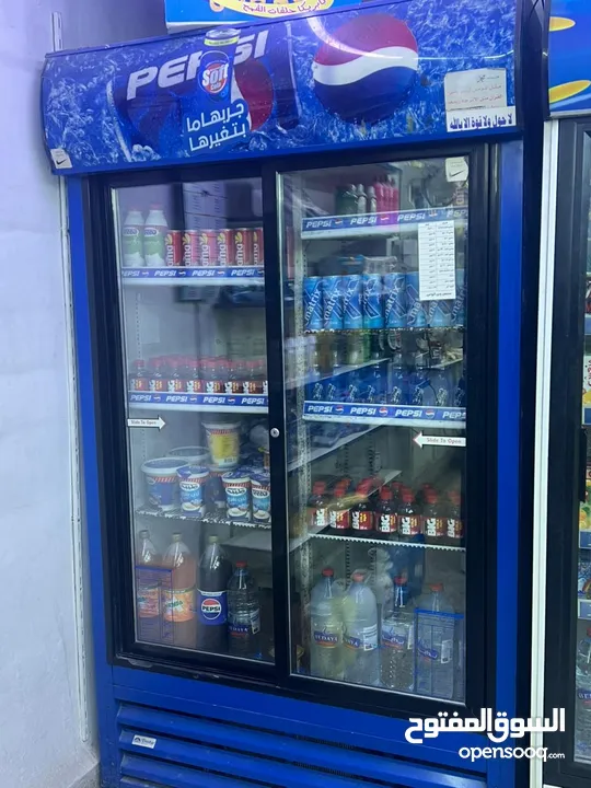 سوبر ماركت محمص للبيع بسعر مغري رقم الهاتف مكتوب داخل الاعلان