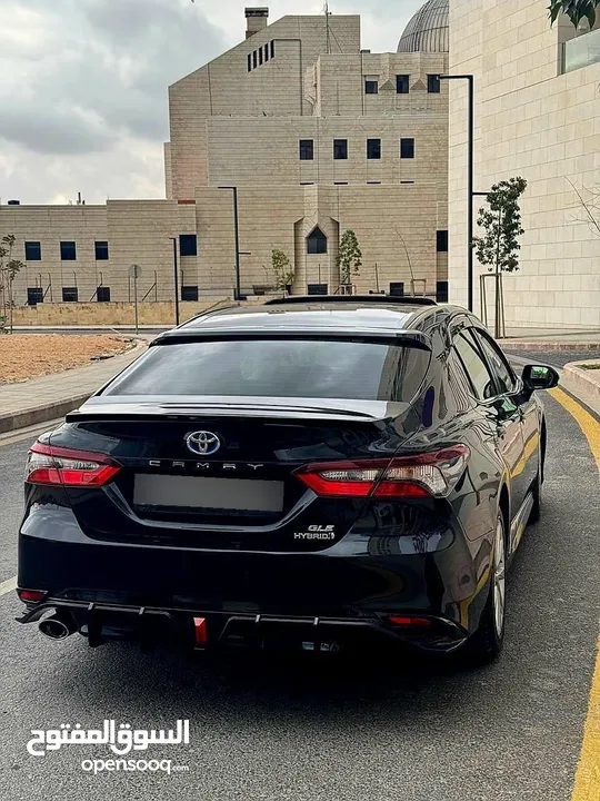 تويوتا كامري 2021 فل كامل مع فتحة فحص كامل 7 جيد كرت ابيض بحالة الشركة
