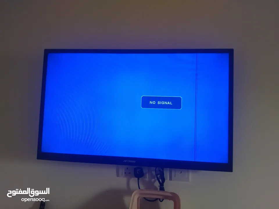 للبيع تلفاز من نوعية AFTRONسمارات tv يوجد خط صغير جدا على الشاشة ولكن التلفاز شغال 100-100