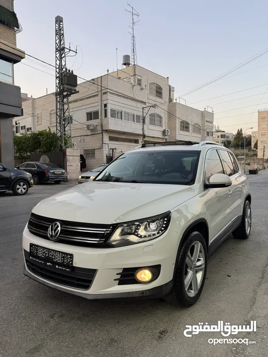 فوكس فاجن تيجوان 2012 بنزين متور 2000 تيربو 4x4 فتحة سقف بانوراما فرش بني مميز عداد قليل فحص ممتاز