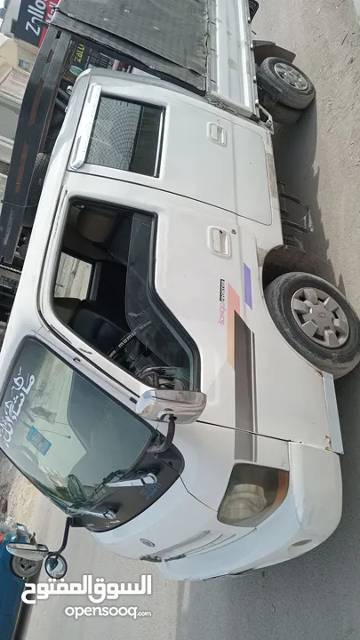 كيا بنجو 2003